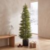 Green Norfolk Pine potted artificial Christmas tree
